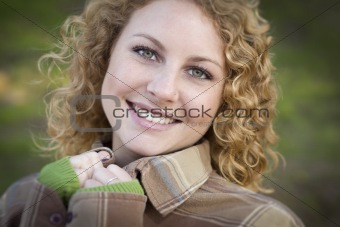 Pretty Young Smiling Woman Outdoor Portrait.
