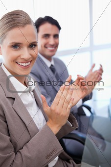 Portrait of a business team applauding