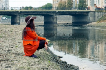 girl on the riverbank