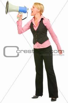 Modern business woman shouting through megaphone
