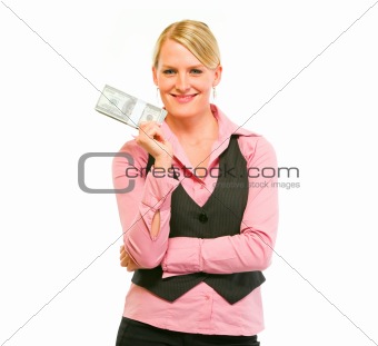 Smiling modern female business secretary holding dollars pack
