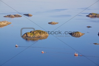 Fishing boats and tiny islands