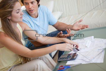 Couple having an argument about their bills