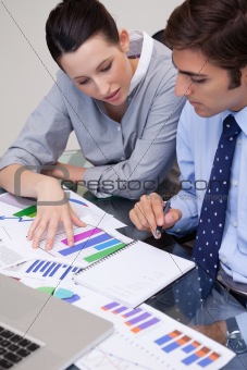 Business team analyzing charts