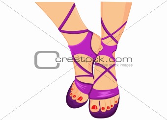 Pretty female feet in purple sandals