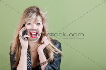 Excited Young Woman on Phone