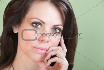 Cute Woman With Fingers On Chin