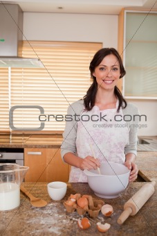 Portrait of a woman baking