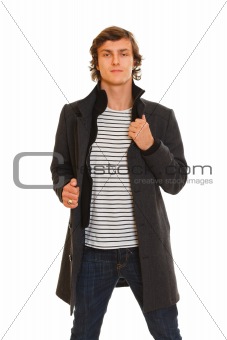 Portrait of young man in winter coat
