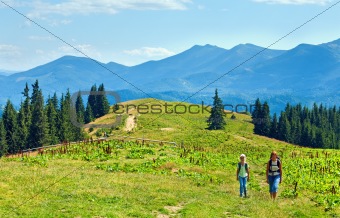 Summer mountain plateau landscape and family