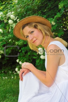 Young woman resting in garden