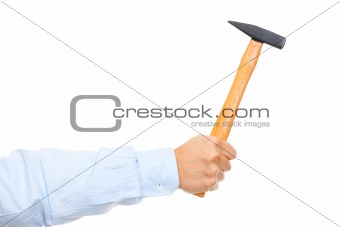 Hand holding hammer
