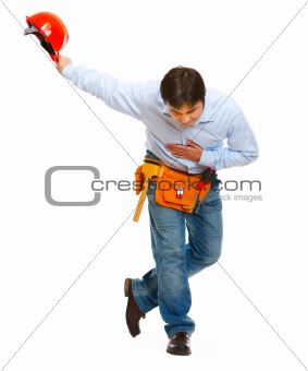Construction worker bowing with helmet in hand
