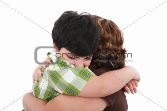 Portrait of happy kid embracing his mother