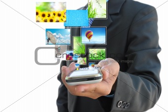 businessman hand holding mobile phone and streaming images virtual buttons