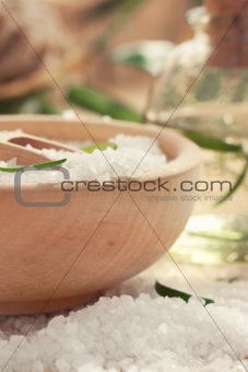 Spa setting with bath salt and floral water
