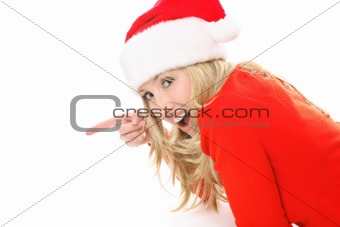 Christmas girl pointing to your message or product.