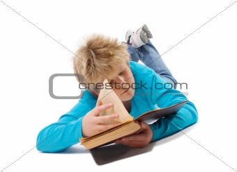 Teenager boy reading old book