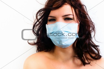 A girl in a protective mask against white isolated background