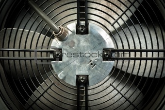 A turbine behind black bars