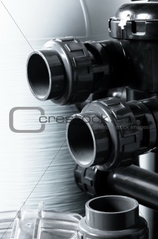 New pipes against steel background