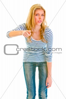 Serious teen girl threatening finger

