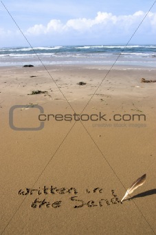 it's written in the sand on a beach