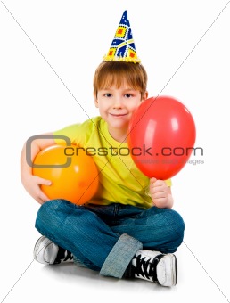 Boy in birthday caps