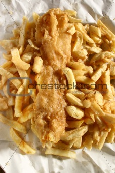 Battered fish and chips in paper