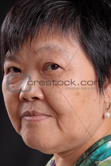 asian woman on black background 