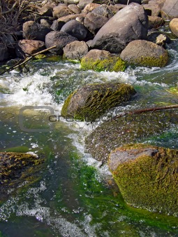 stone in river flow