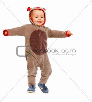 Adorable baby in costume of Santa Claus's reindeer dancing
