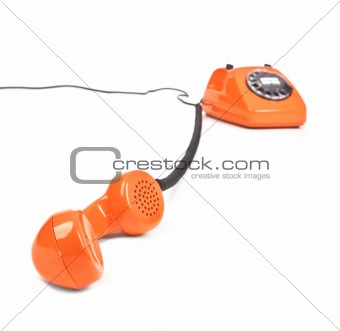 classic dial phone on white background
