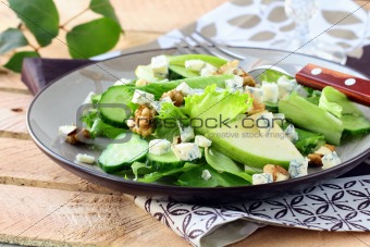Salad with apple, cheese and walnuts