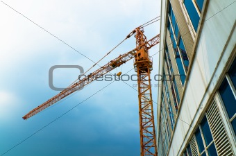 Orange crane lifting