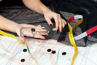 female hands choosing buttons