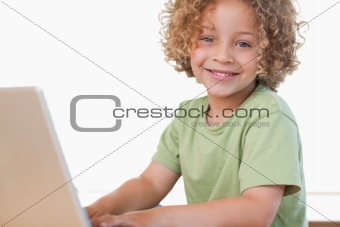 Boy using a notebook