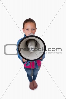 Portrait of a girl speaking through a megaphone