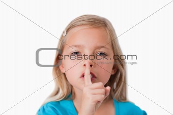 Young girl asking for silence