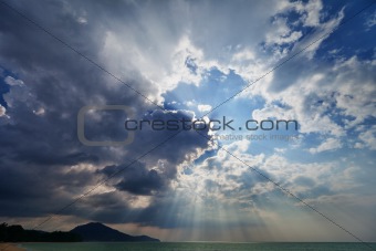 Sky over the sea with rays of sun