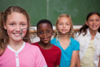 Classmates posing in a row