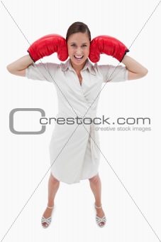 Portrait of a businesswoman with boxing gloves