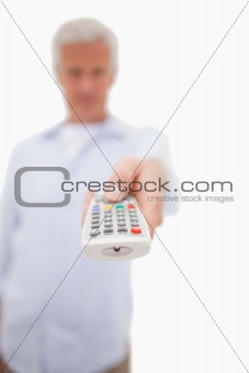 Portrait of a man switching of channel