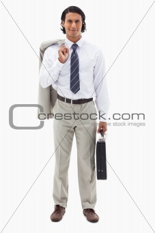 Portrait of an office worker holding his jacket over his shoulder and a briefcase
