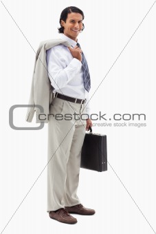 Portrait of a happy office worker holding his jacket over his shoulder and a briefcase