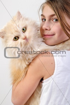 chilld with a Persian cat