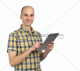 Handsome man using a tablet computer