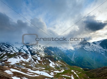 Evening cloudy Alps summer view