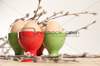 Eggs in red and green eggcups