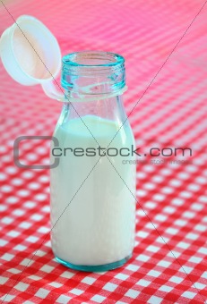 bottle of milk on table